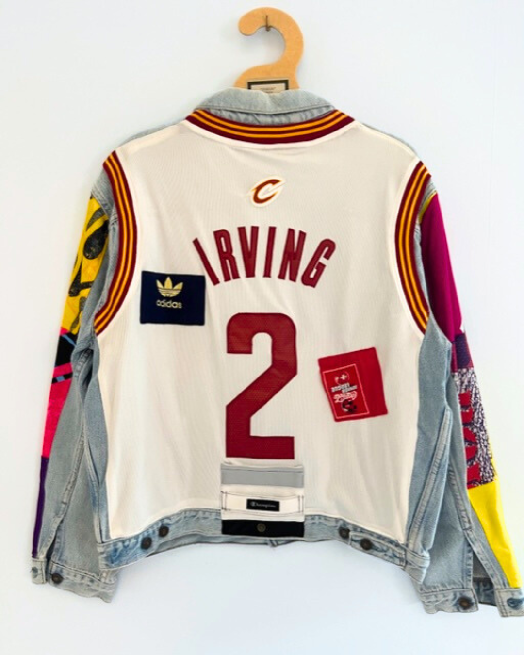 Vintage LEVIS Denim Trucker Jacket with Basketball Jersey back and vintage sportswear panelling